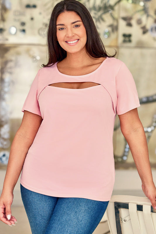 A playful and cute plus size t-shirt with a pink peekaboo cutout in the front, perfect for adding a bit of fun to any outfit!