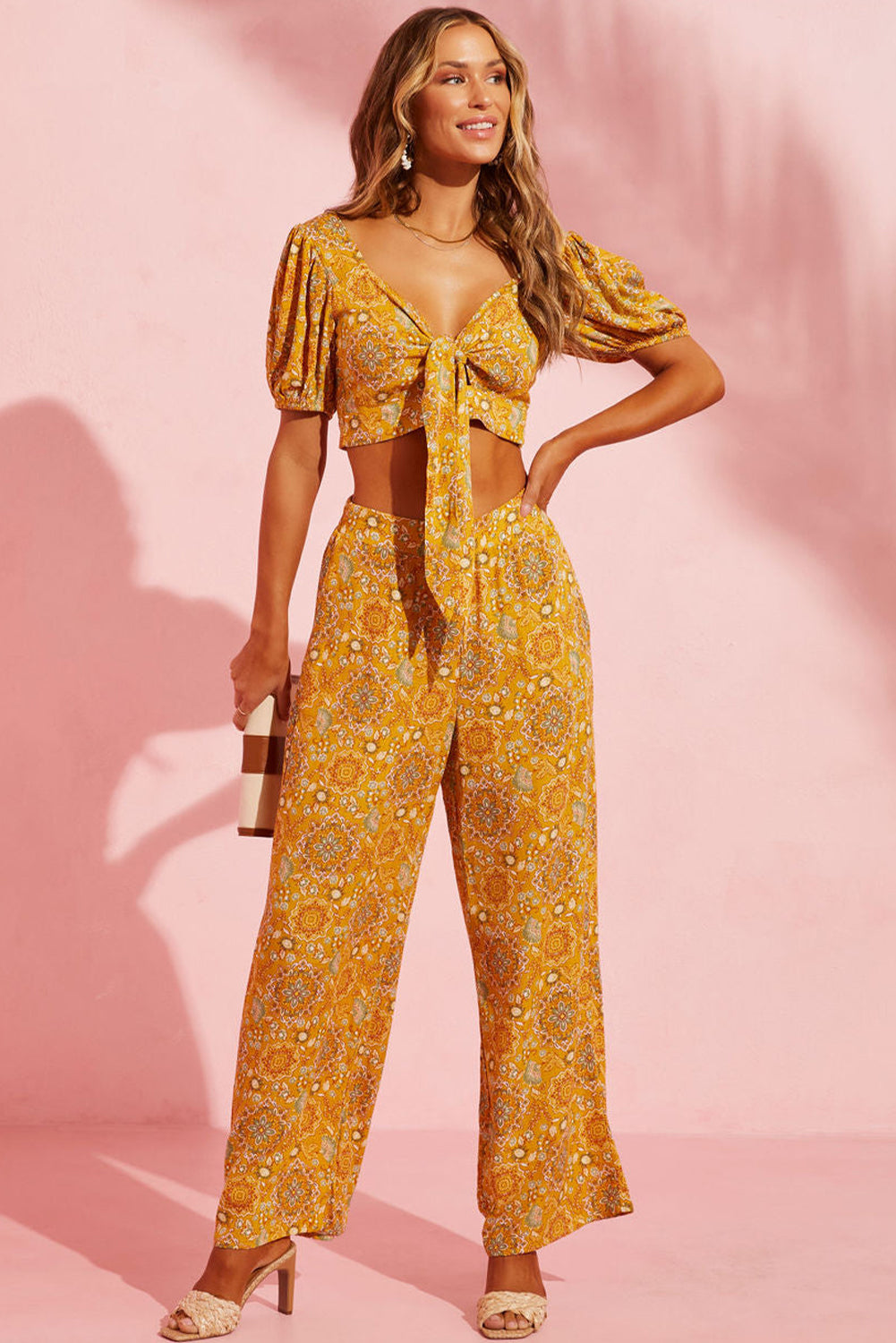 Beautiful yellow floral-print wide-leg paneling and side pockets for a subtle vintage-inspired look that is as practical as it is stylish. Crafted with lightweight 100% Viscose fabric for a comfortable bohemian feel. A perfect accompaniment to any look!