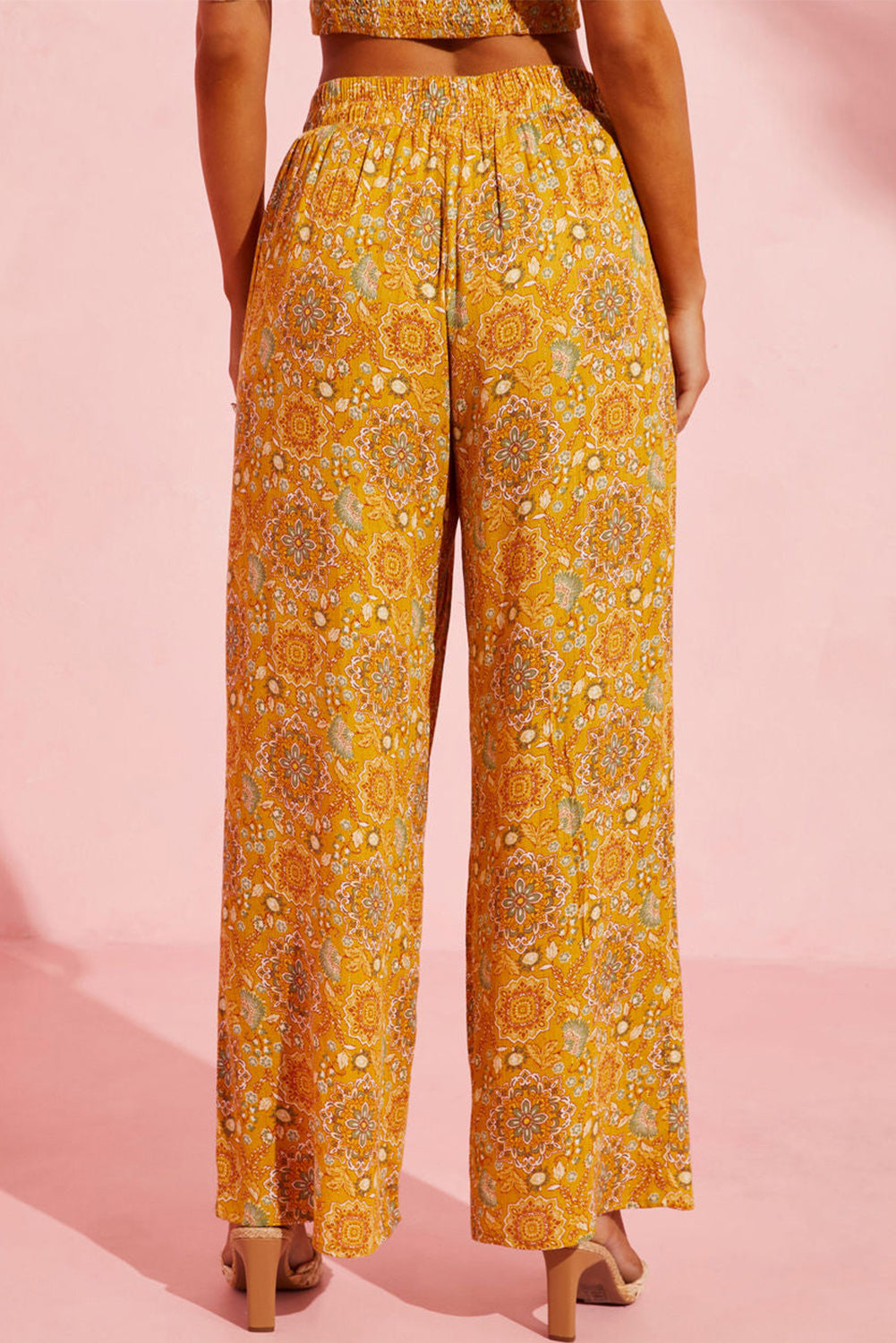 Beautiful yellow floral-print wide-leg paneling and side pockets for a subtle vintage-inspired look that is as practical as it is stylish. Crafted with lightweight 100% Viscose fabric for a comfortable bohemian feel. A perfect accompaniment to any look!