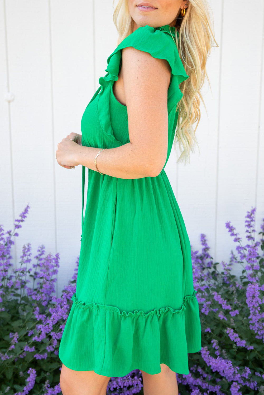 Fun and flirty summer fashion with vibrant colour and feminine ruffle details.