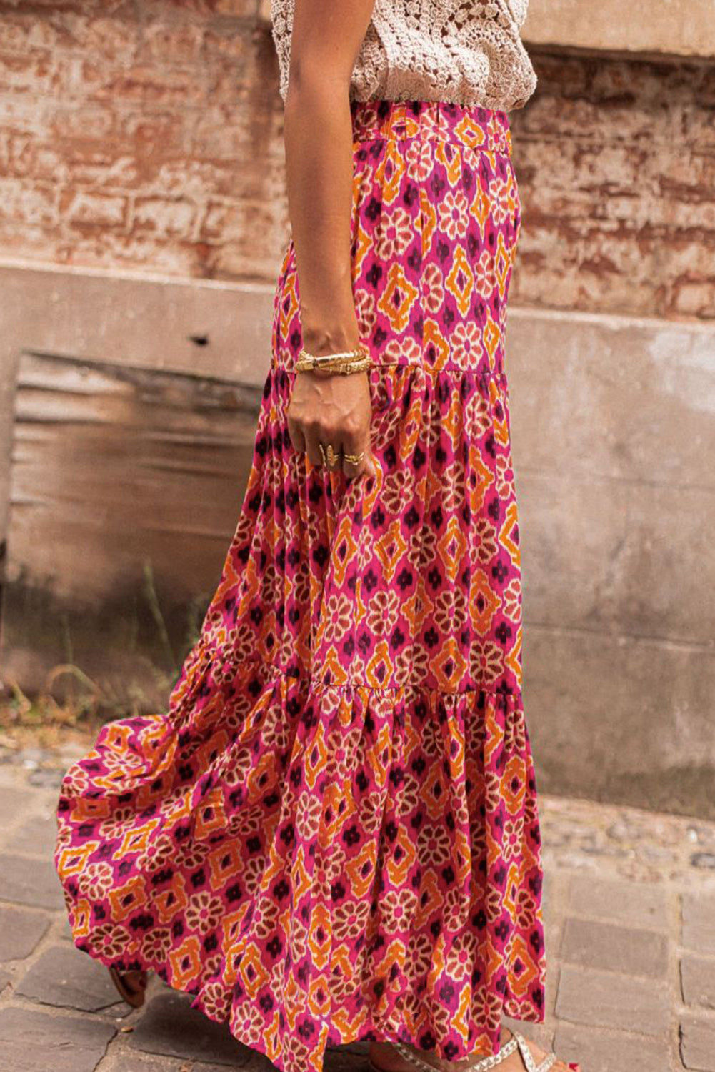 Romantic vintage floral print tiered maxi skirt in a classic rose colour for a timeless look.