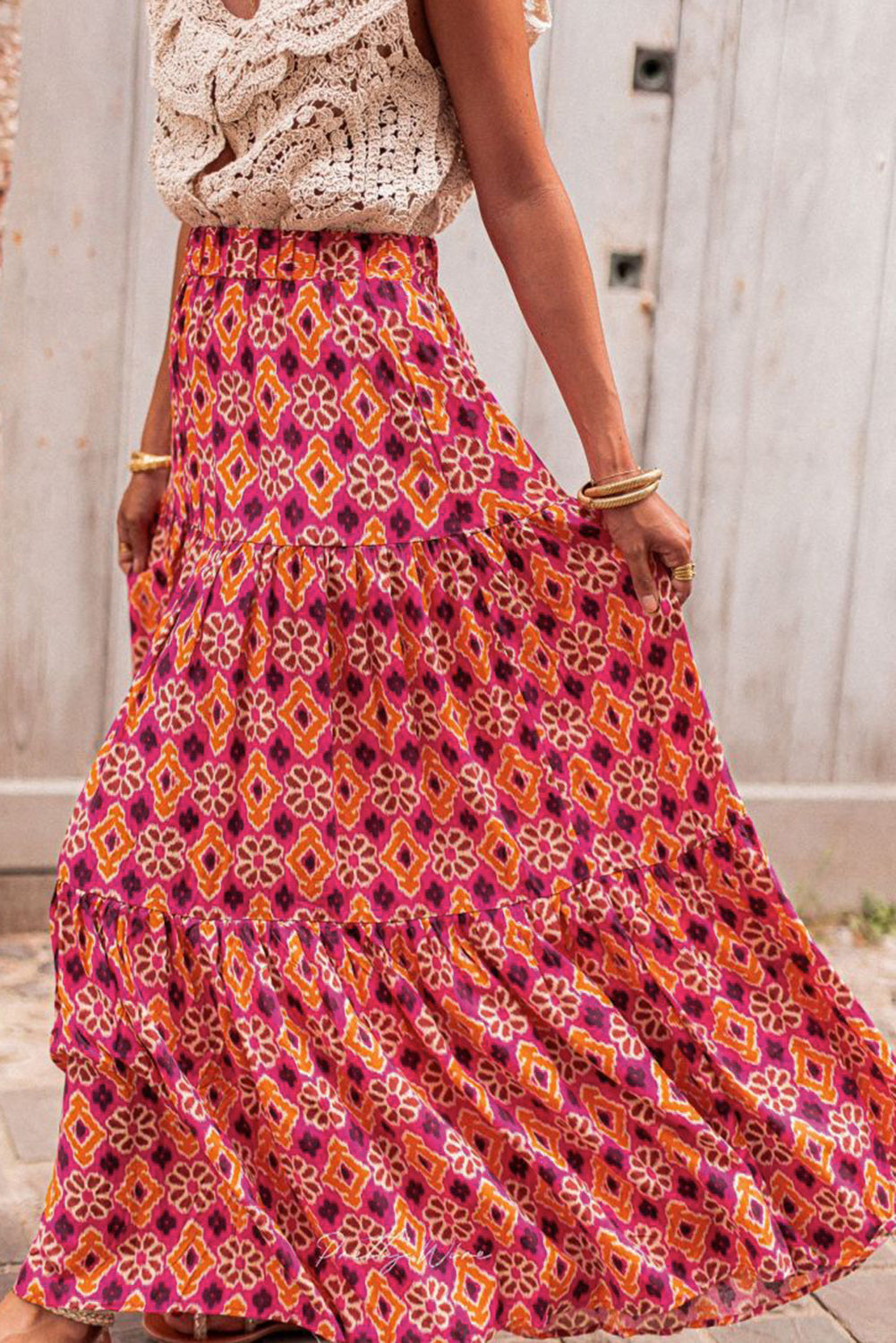 Romantic vintage floral print tiered maxi skirt in a classic rose colour for a timeless look.