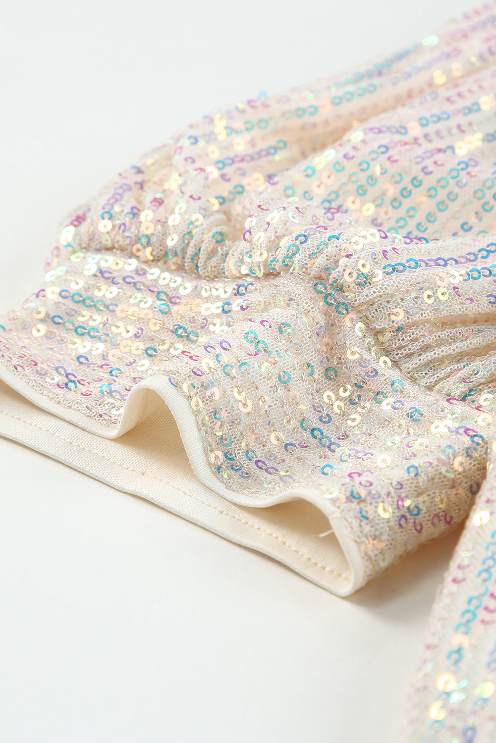 Add sparkle and style to your wardrobe with the Sequin Puff Sleeve Top! This top features glimmering sequin sleeves and a soft body fabric for a comfortable and fashionable ensemble when worn with your favourite jeans.