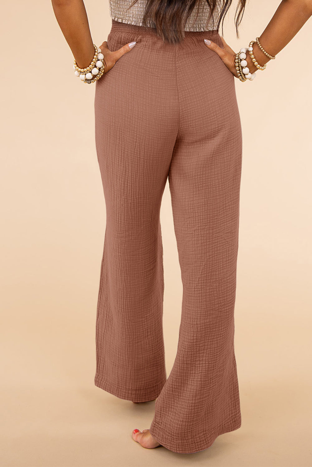 Texture that flatters - these high waisted wide leg plus size pants create an elegant look that is both comfortable and stylish for any occasion.