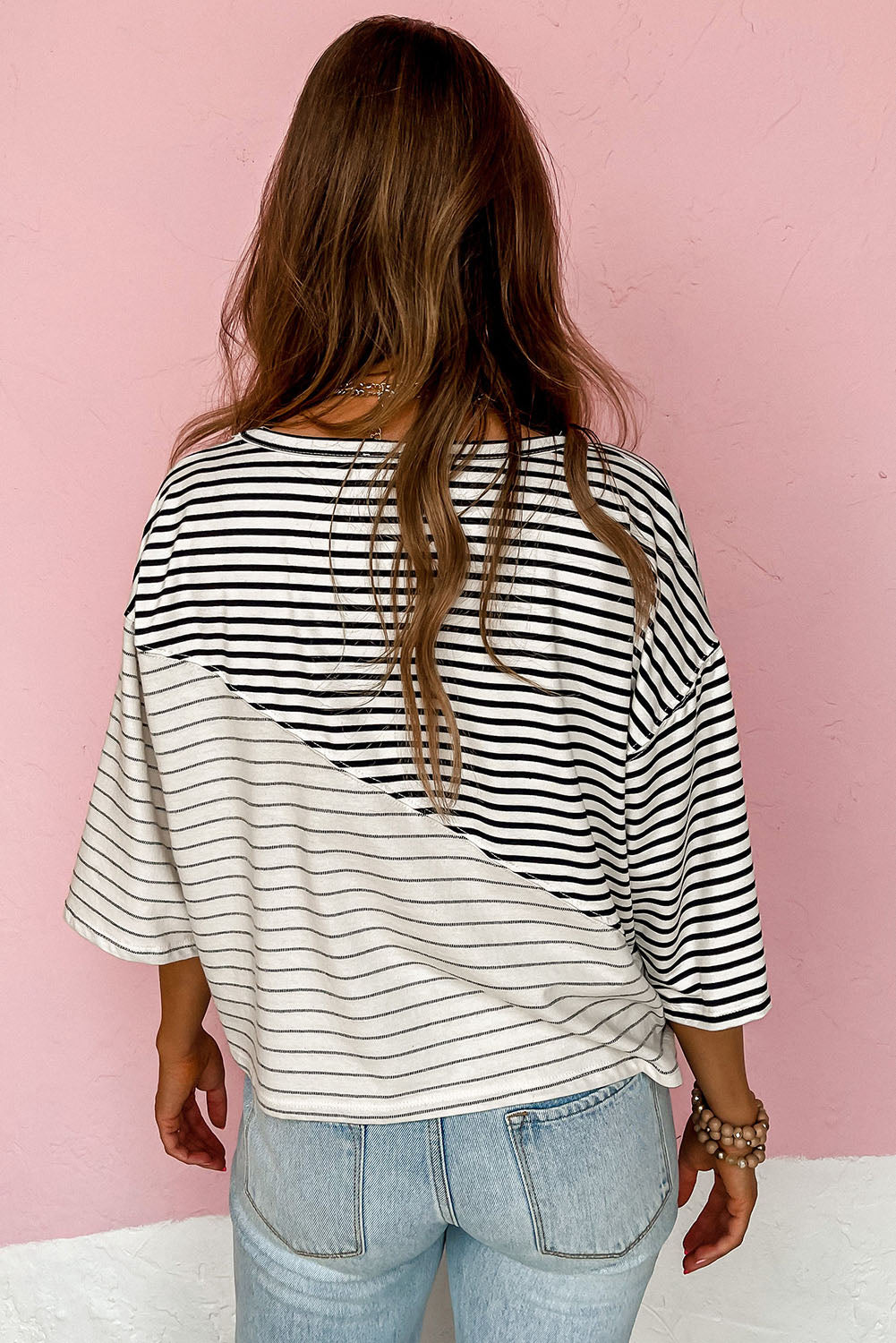 Classic striped short sleeve top with unique patchwork and drop-shoulder design.