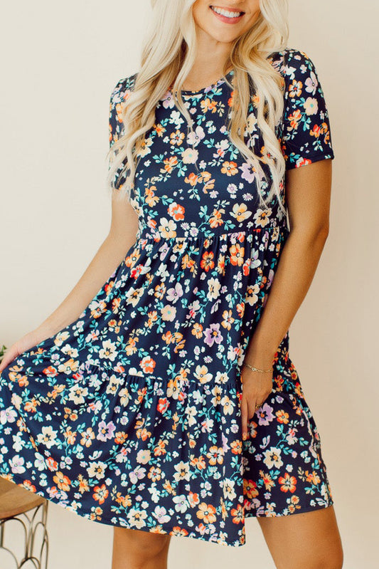 Floral printed short dress with round neck and ruffle skirt.