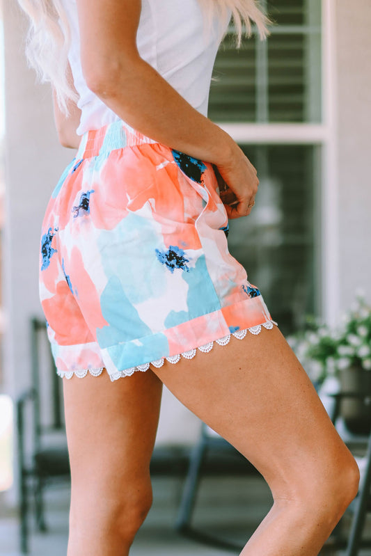 Pair of abstract blue water marbled shorts with a delicate lace trim.