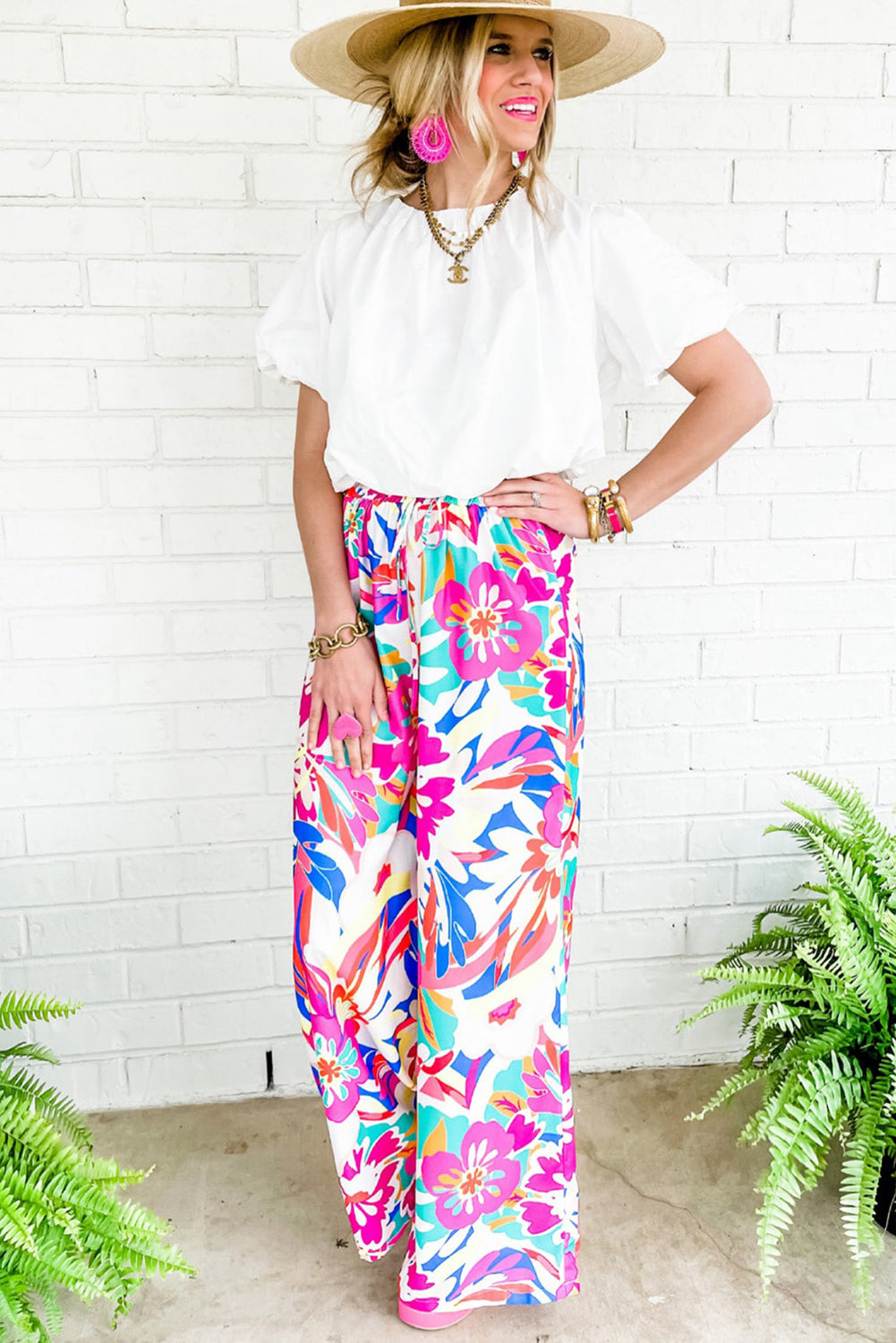 Boho-inspired, high waist wide-leg pants with sweet flower print.