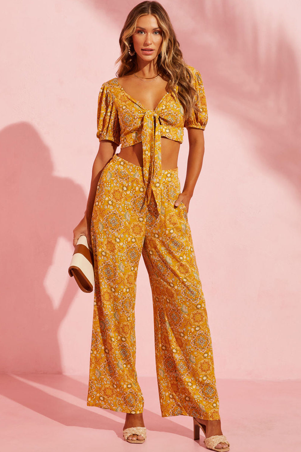 Beautiful yellow floral-print wide-leg paneling and side pockets for a subtle vintage-inspired look that is as practical as it is stylish. Crafted with lightweight 100% Viscose fabric for a comfortable bohemian feel. A perfect accompaniment to any look!