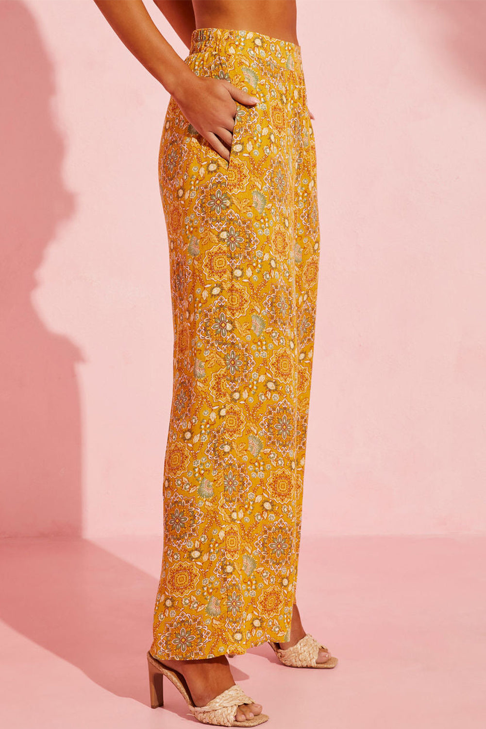 Beautiful yellow floral-print wide-leg paneling and side pockets for a subtle vintage-inspired look that is as practical as it is stylish. Crafted with lightweight 100% Viscose fabric for a comfortable bohemian feel. A perfect accompaniment to any look!