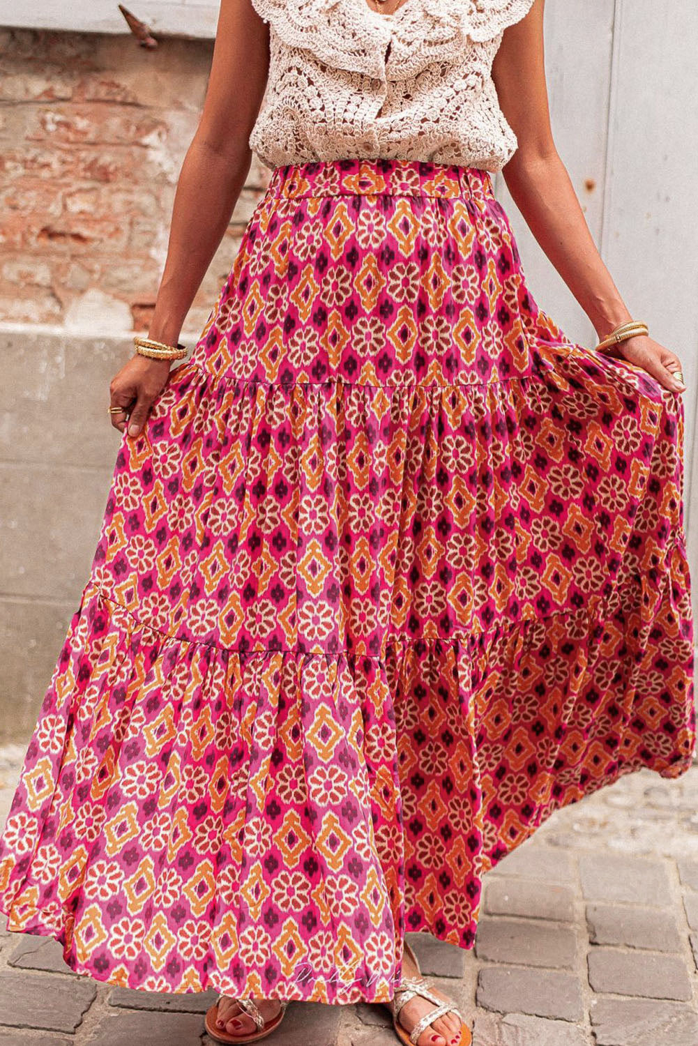 Romantic vintage floral print tiered maxi skirt in a classic rose colour for a timeless look.