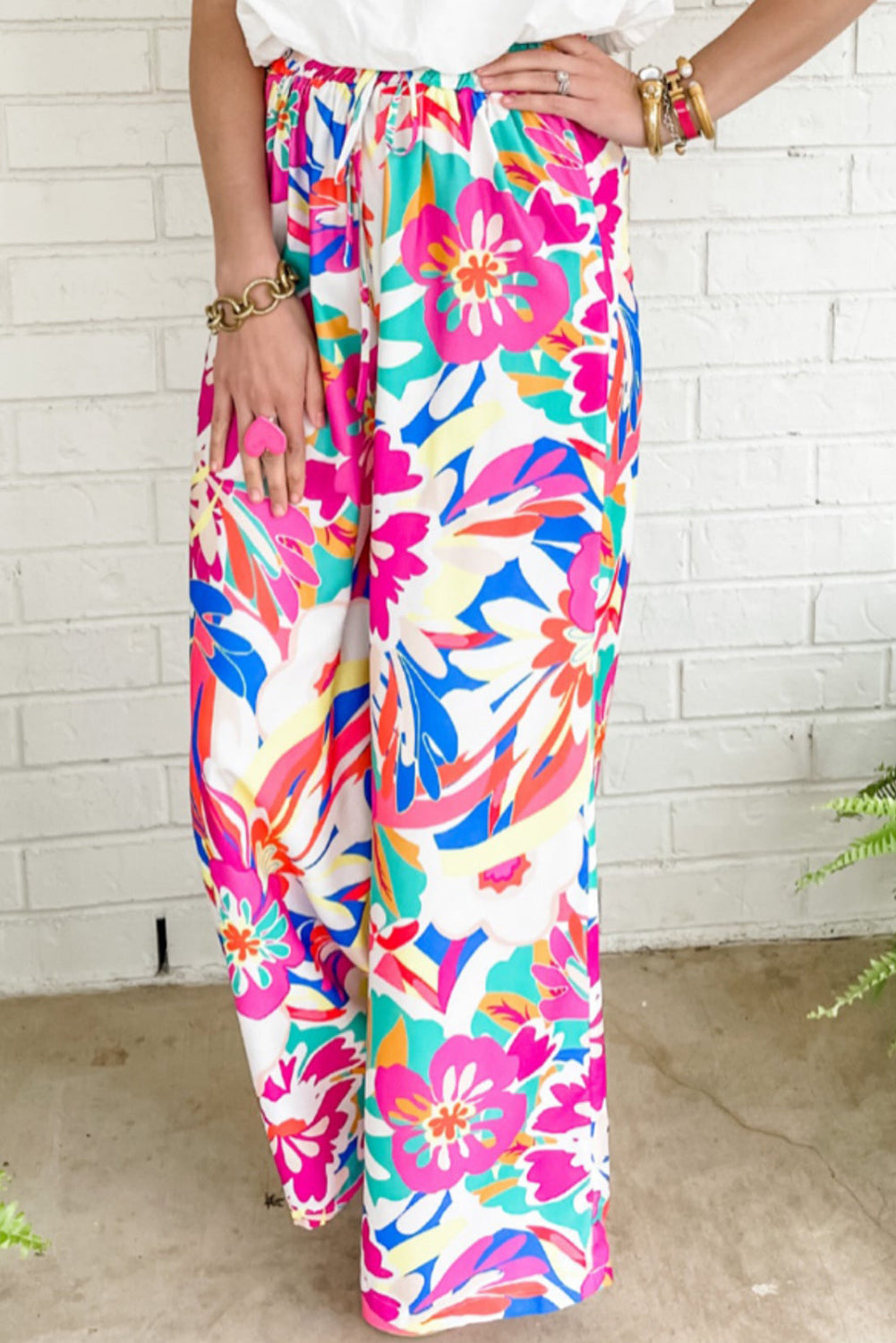 Boho-inspired, high waist wide-leg pants with sweet flower print.